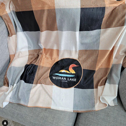 the teehive customer showcase, dye sublimated blanket with a customized logo